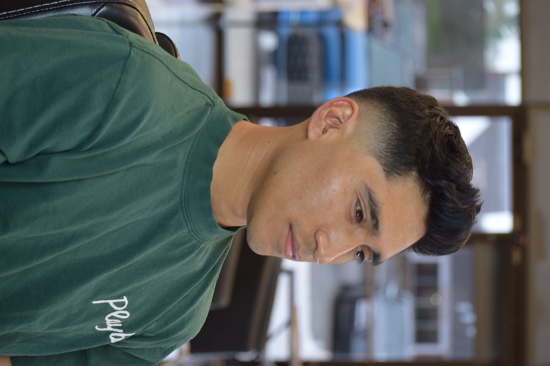 Client with a textured crop cut and clean neckline